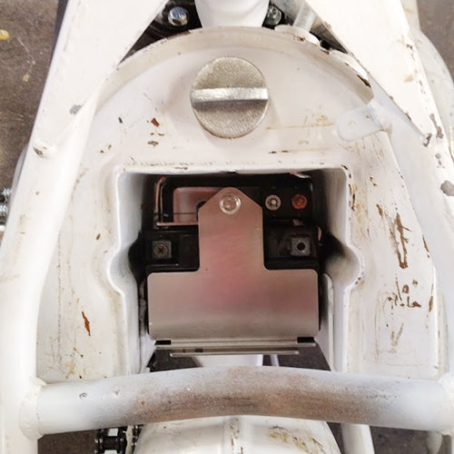 Battery box for horseshoe oil tank